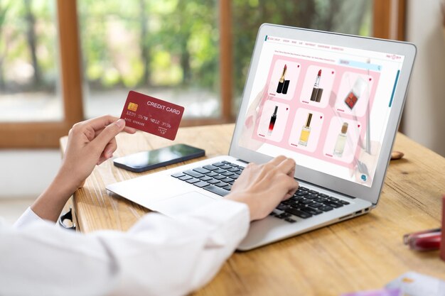 Woman shopping online on internet marketplace browsing for uttermost sale items