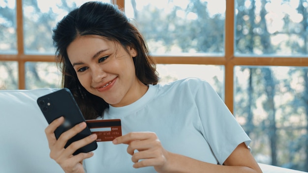 woman shopping or pay bills online on internet vivancy shopping