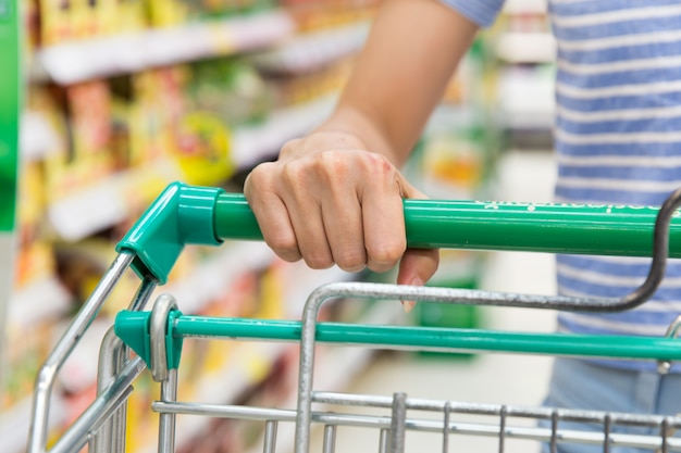 Woman shopping in supermarket