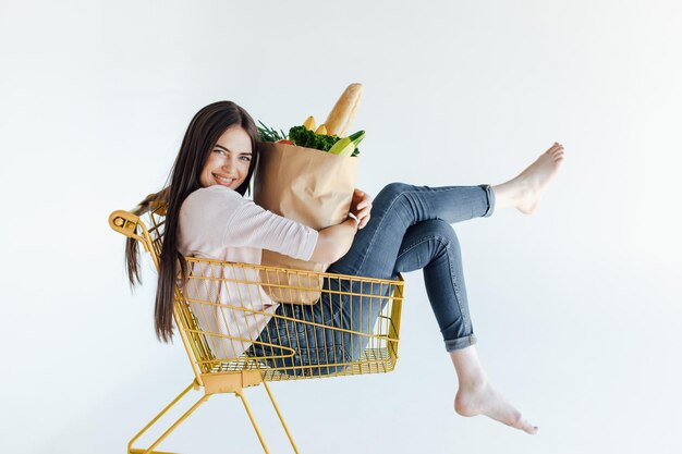 woman in shopping trolley