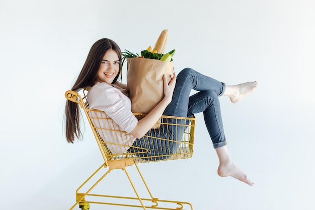 woman in shopping trolley