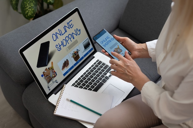 Woman shopping using laptop and ads