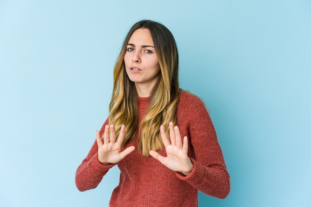 Photo woman showing a gesture of disgust