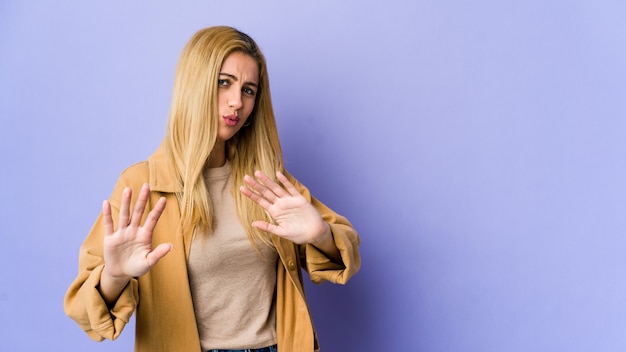 Woman showing a gesture of disgust