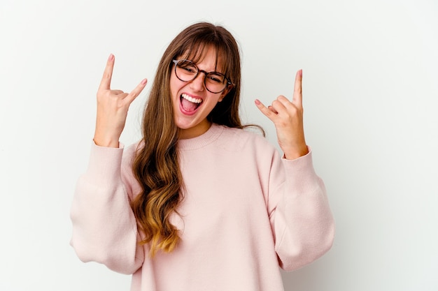 woman showing a horns gesture as a revolution