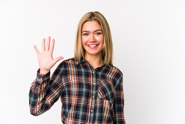 Woman showing number five with fingers