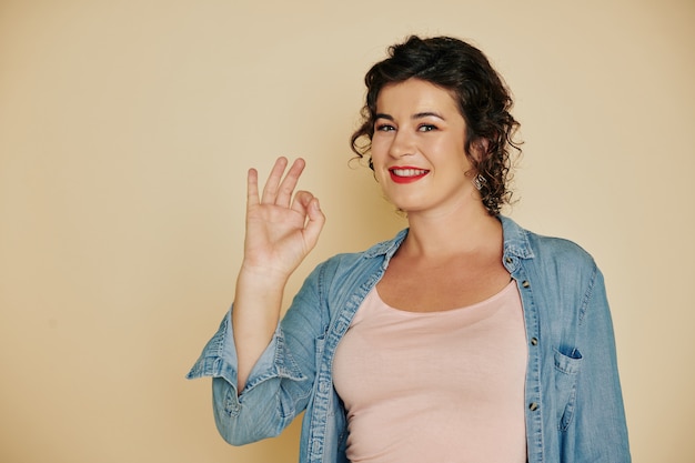 Woman showing ok sign