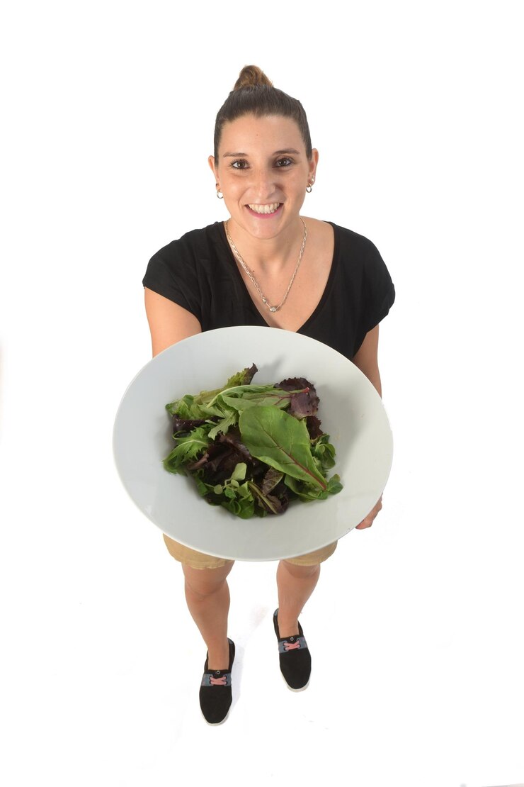 Woman showing a saled on white background