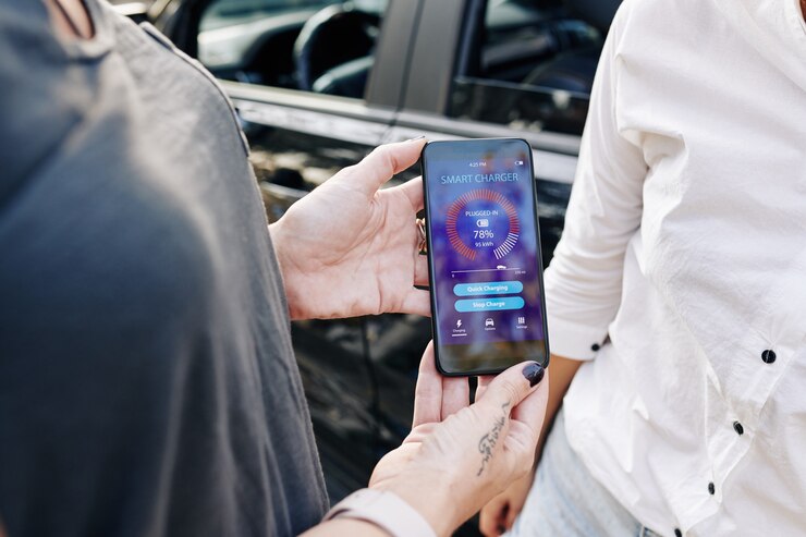 Photo woman showing smart charger app