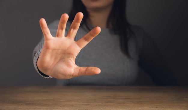 Woman showing stop with her hand