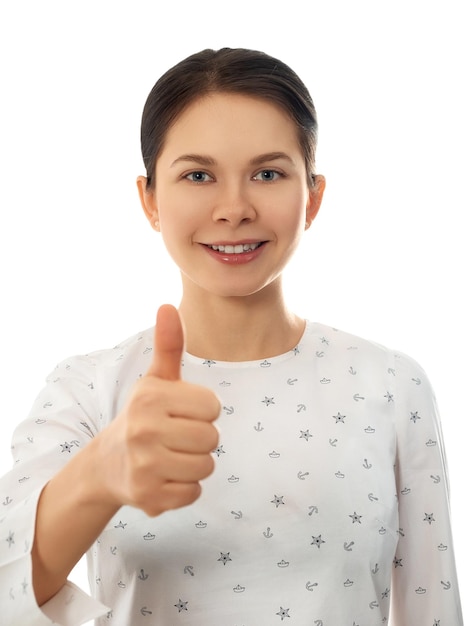 Woman showing thumb up sign isolated on white Positive reaction approval sign and recommendation