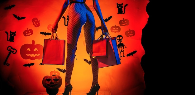 Woman shows a beautiful ass or butt halloween poster with pumpkins female with sexy ass posing on