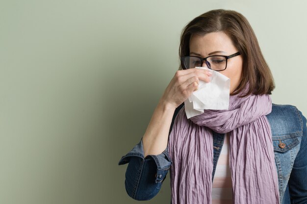 Woman sick with handkerchief