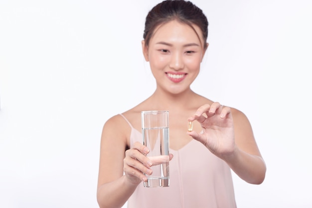 Woman sick, woman with pill and glass of water