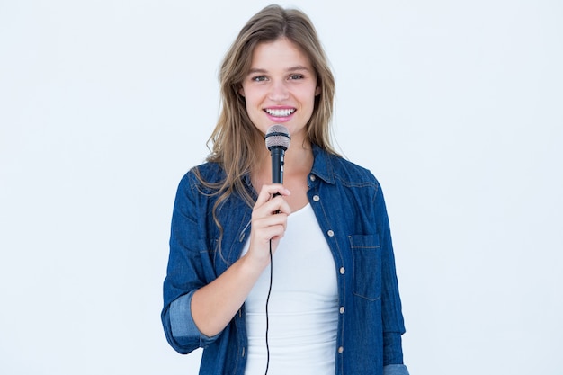 Woman singing with a microphone