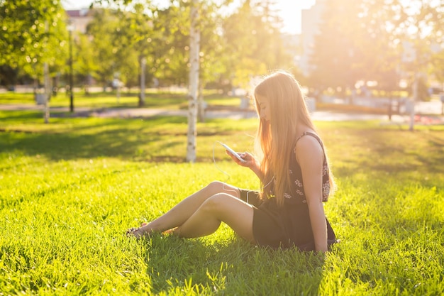 Woman sitting on field