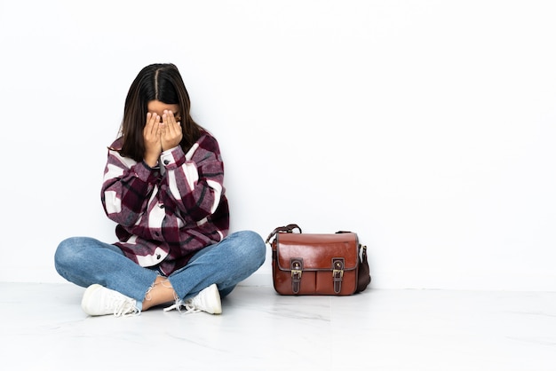 Woman sitting on the floor