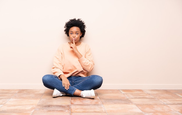 woman sitting on the floor