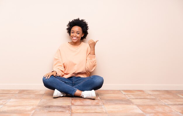 Woman sitting on the floor