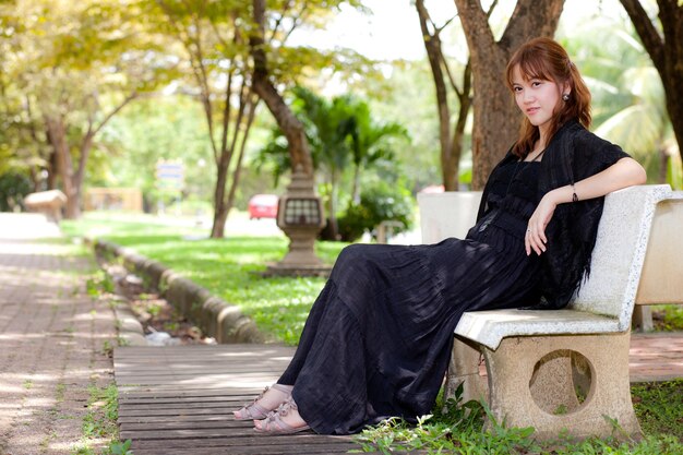 Woman sitting in the garden.