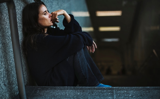 Woman Sitting Look Worried on The Stairway