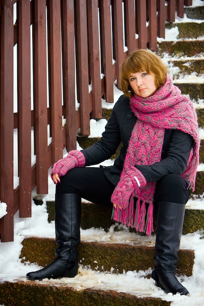 Woman Sitting on the Steps