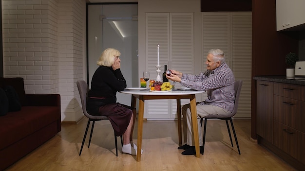 Woman sitting on table at home