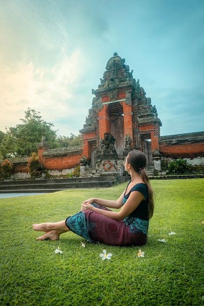 Woman Sitting on Yard Photo