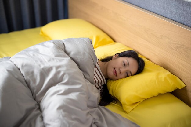 Woman sleep on bed at home