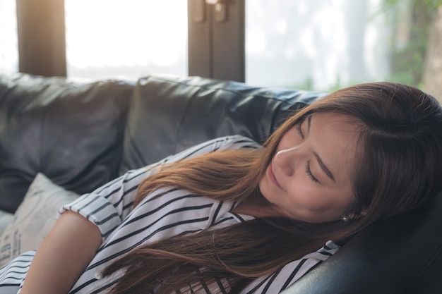 Woman sleep on sofa 