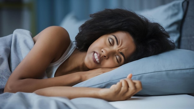 Photo woman sleeping on the bed and grinding teethtiredness and stress