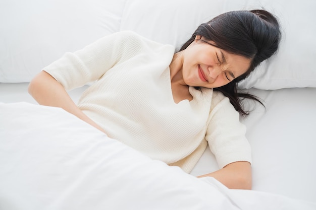 woman sleeping on bed
