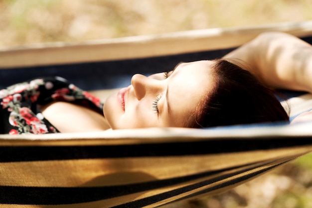 woman sleeping in hammock