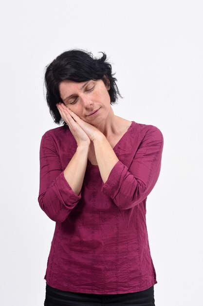 Woman sleeping on white background