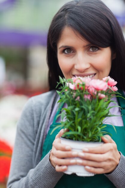 Woman smelling the flower