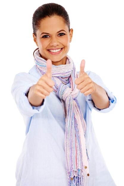 Woman smile and thumbs up for winning deal or discount against a white studio background Portrait of isolated female smiling and showing thumbsup for good job sale or finished on white background