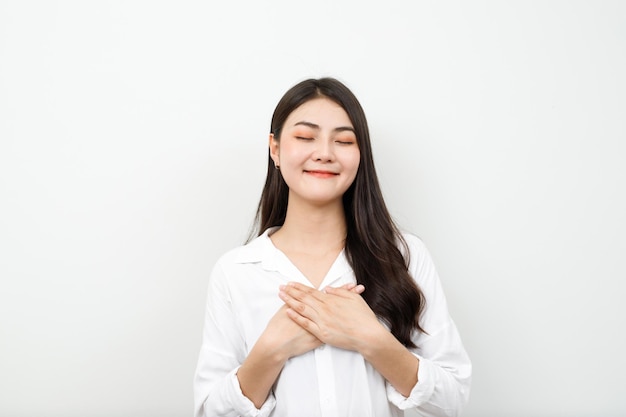 A woman smiles happily after winning a special prize