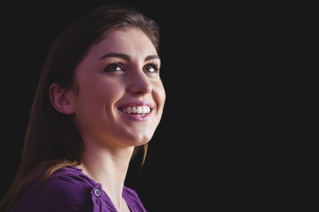 Woman smiling and looking up