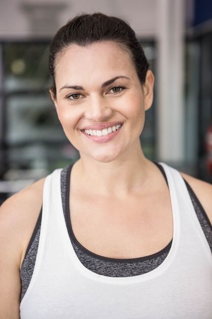 Woman smiling in sportswear in the gym