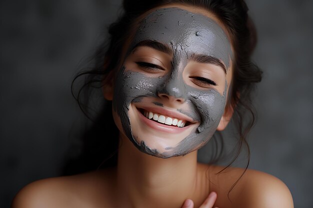 Woman smiling with grey face mask on her face