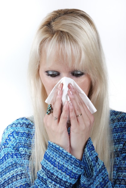 Woman sneezing