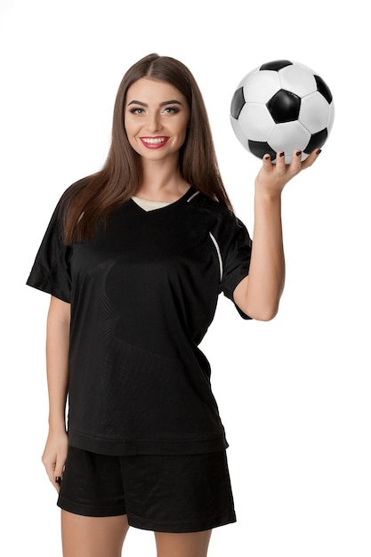 Woman soccer player with soccer ball on white background