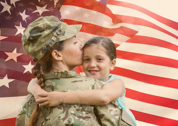 woman soldier with daughter in front of usa flag