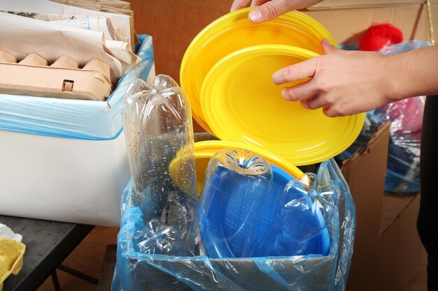 Woman sorting waste closeup