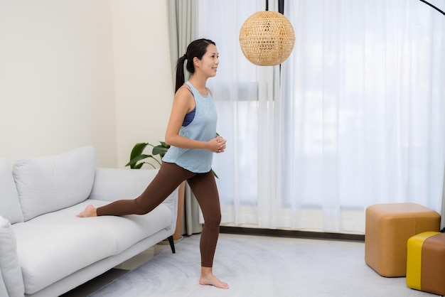 Woman do squat at home