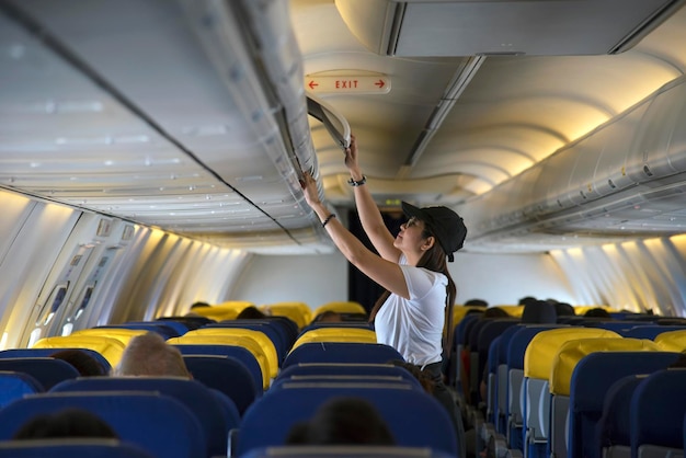 Woman standing in airplane