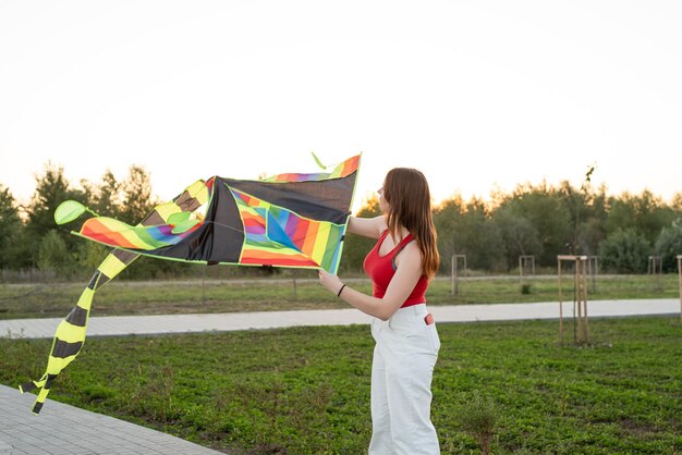 Woman standing on field against clear sky