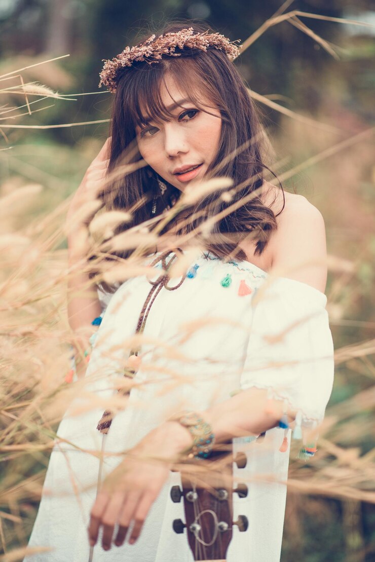 Photo フィールドに立っている女性