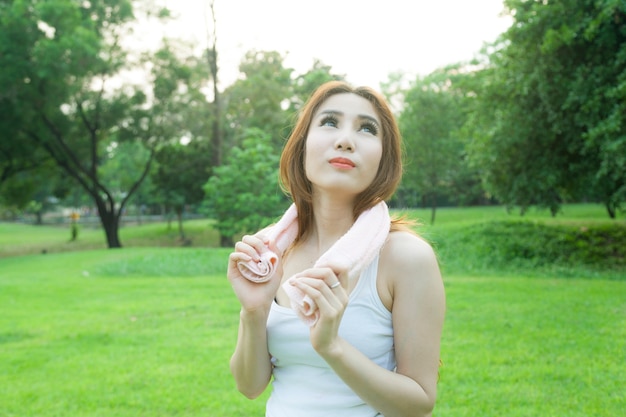 Woman standing rest after jogging.