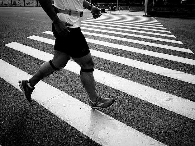 Woman standing on road